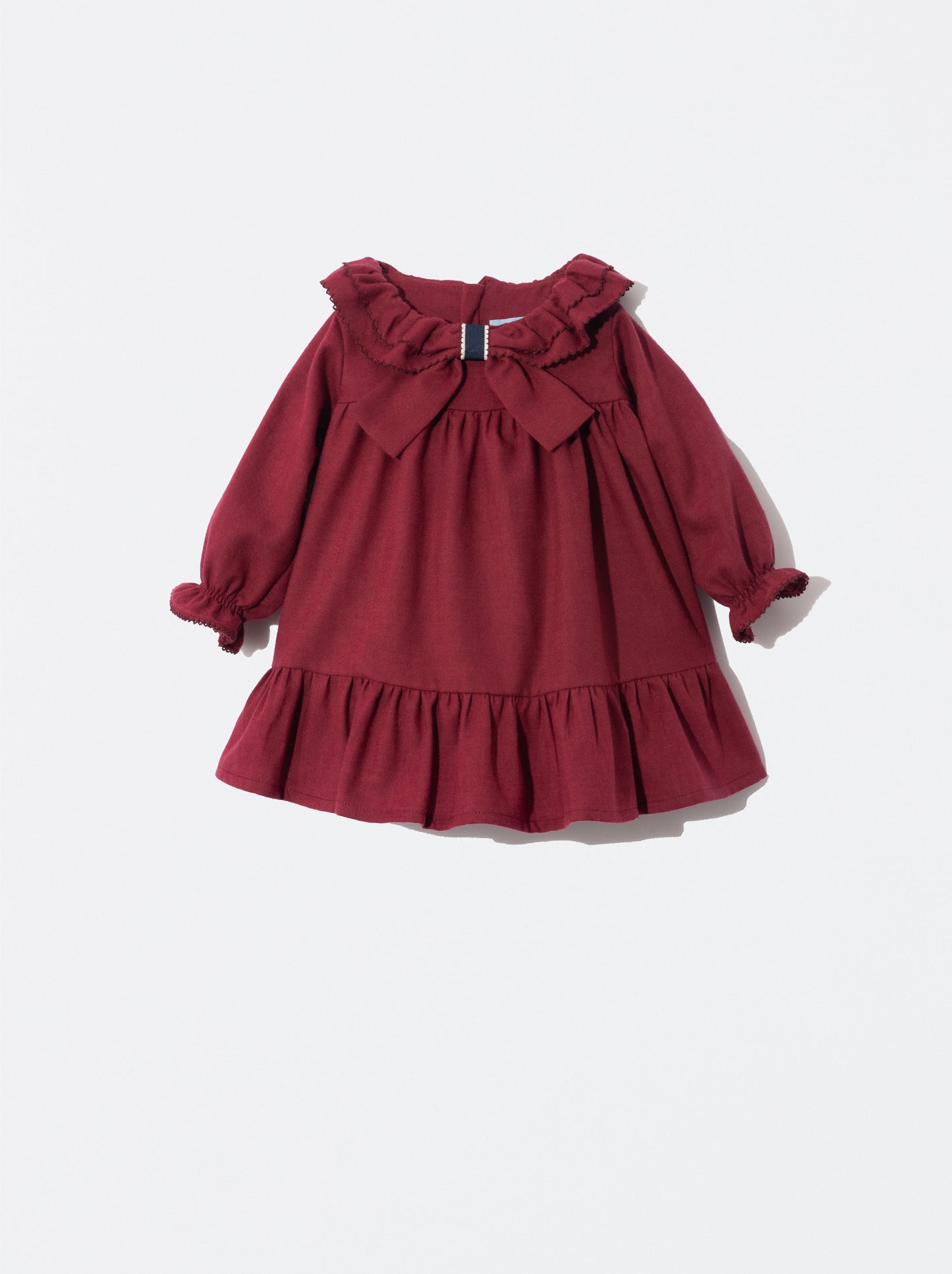 Vestido com laço na gola