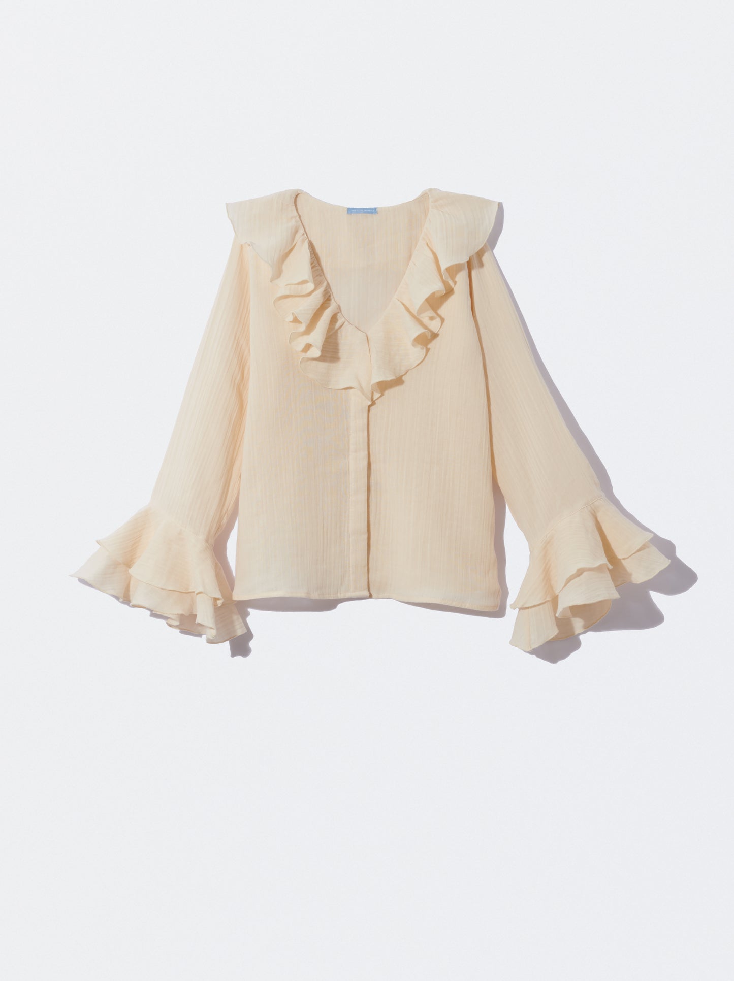 Camisa mulher bege com folhos