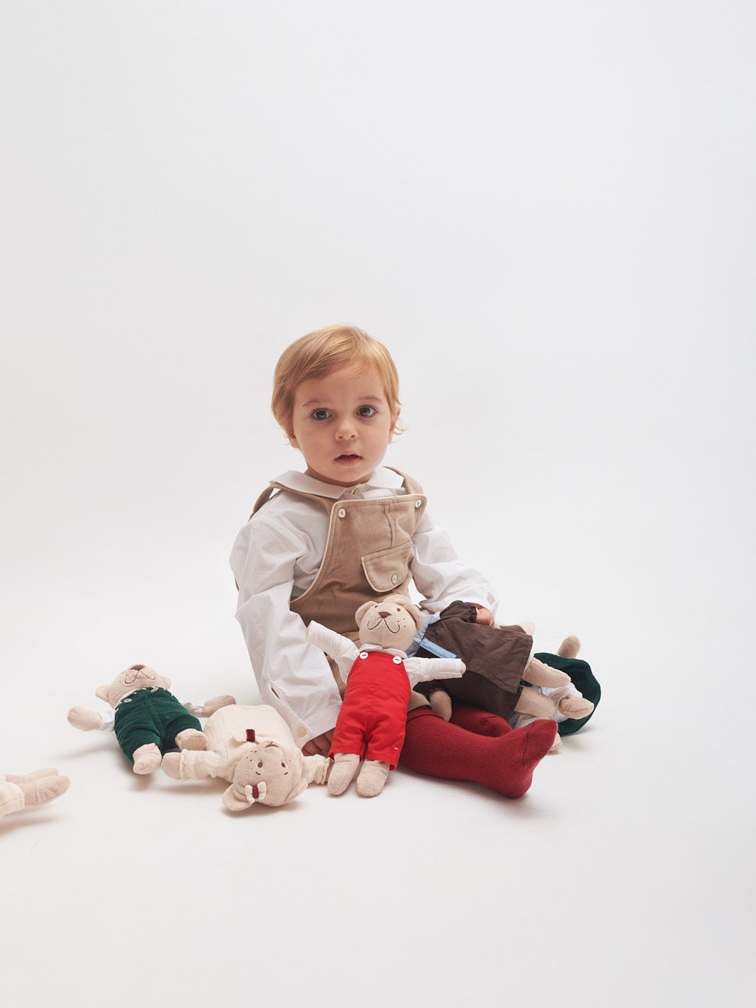 Jardineiras em veludo bege