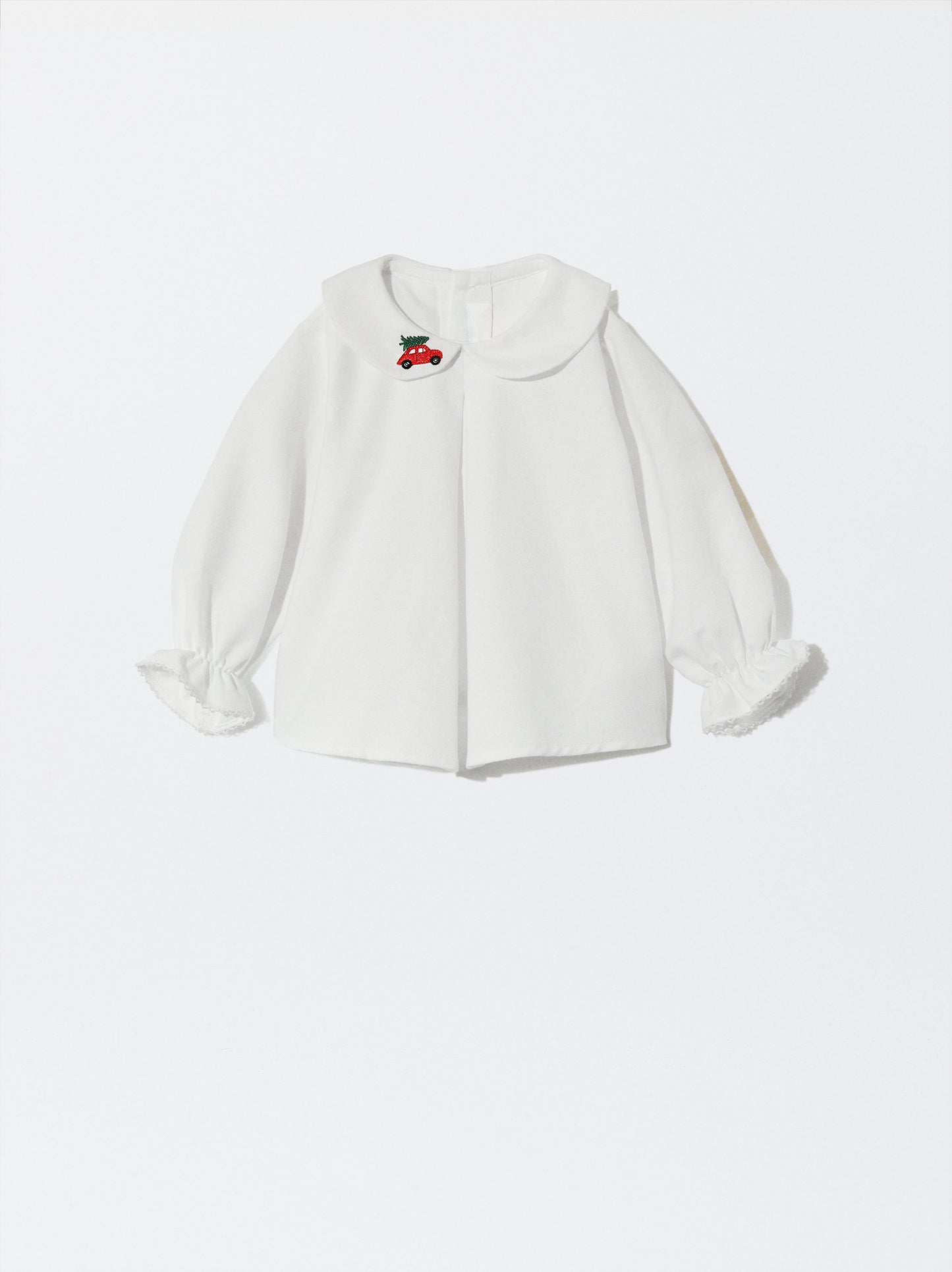 Blusa com bordado de carrinho