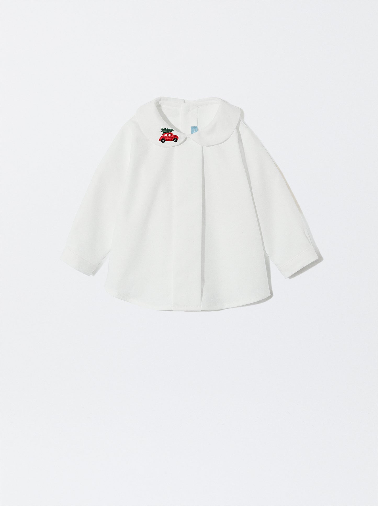 Blusa com bordado de carrinho