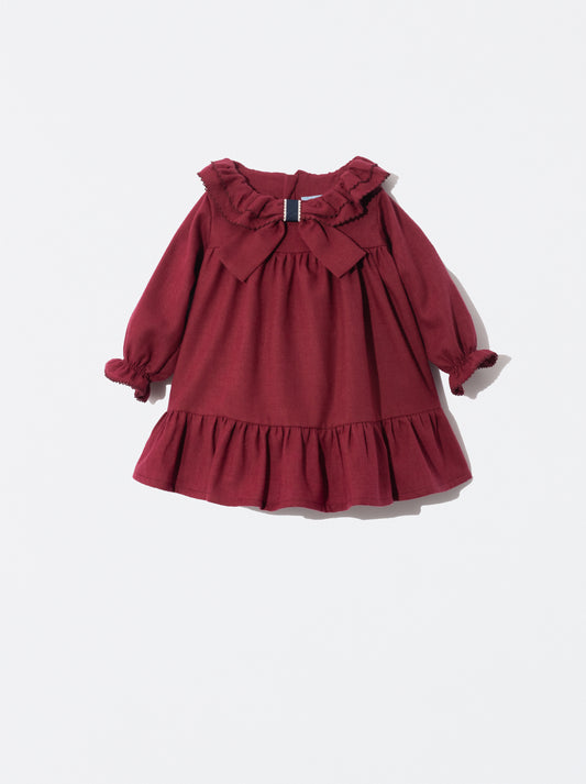 Vestido com laço na gola