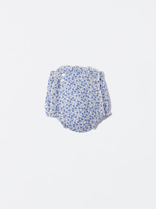 Tapa-fraldas com padrão floral