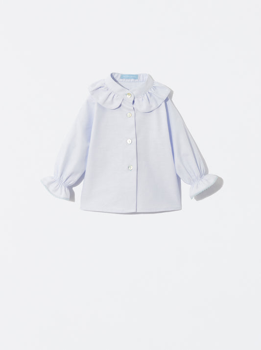 Blusa azul com detalhe de folho