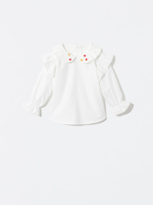 Blusa com estrelas e folho