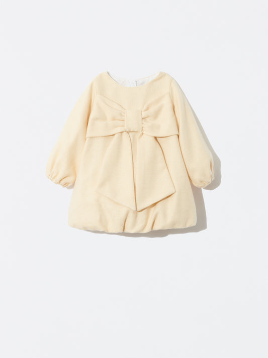 Vestido bege com laço