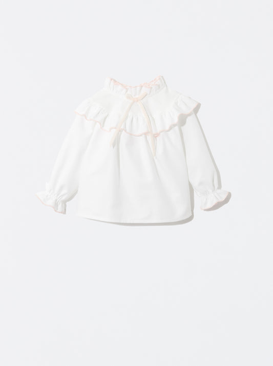 Blusa com detalhe de laço rosa