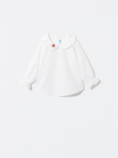 Blusa com bordado de cogumelo