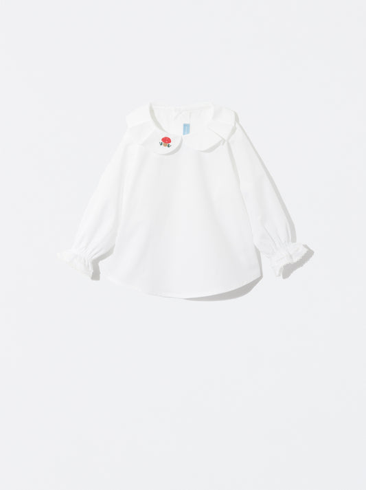 Blusa com bordado de cogumelo