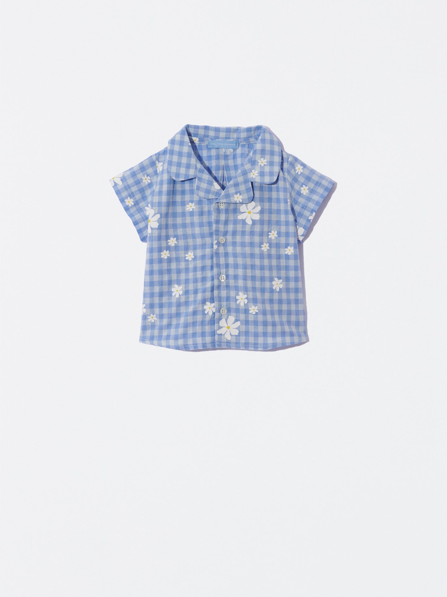 Camisa xadrez com flores