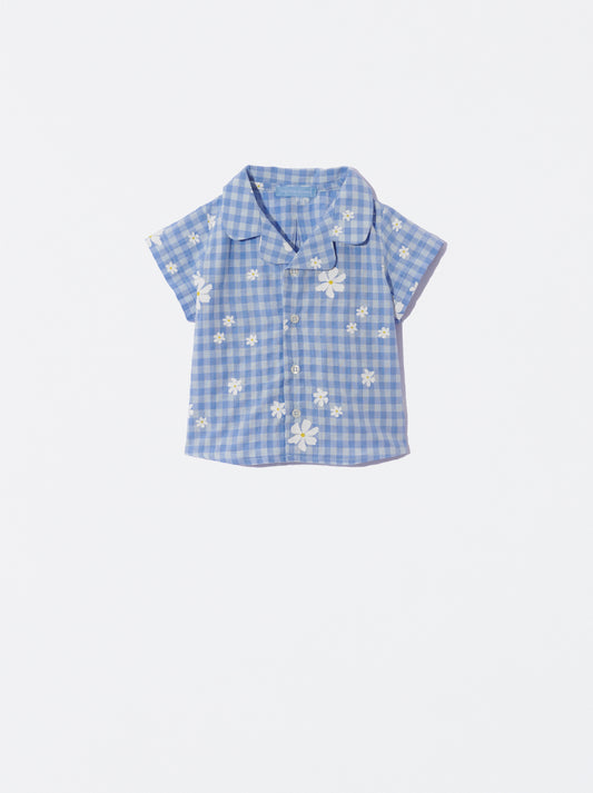 Camisa xadrez com flores