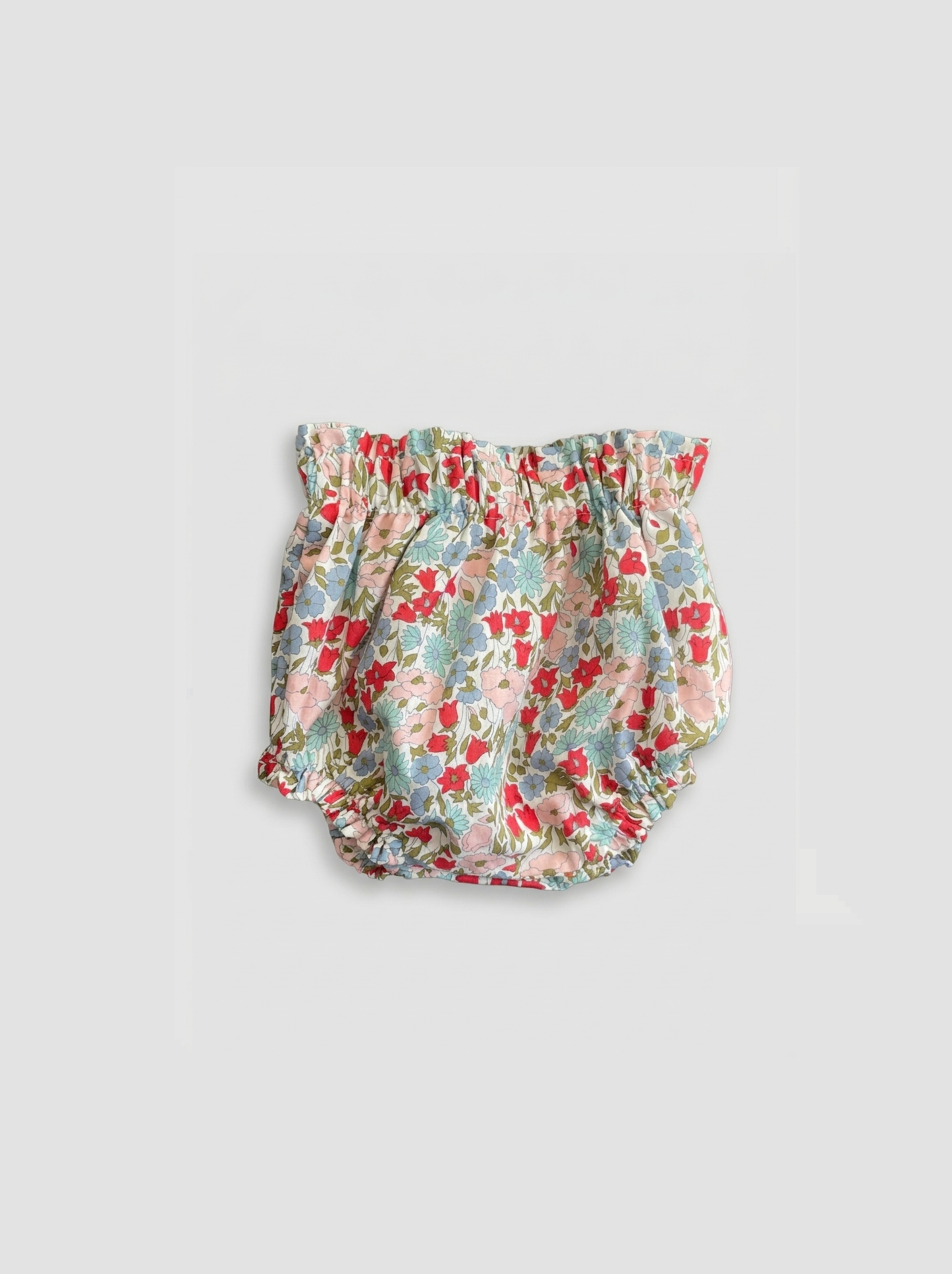 Tapa-fraldas com padrão floral rosa