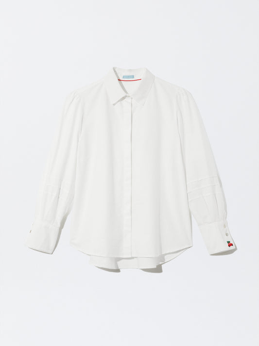 Camisa de mulher com bordado de carrinho