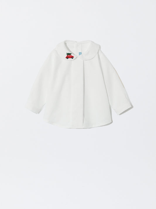 Blusa com bordado de carrinho