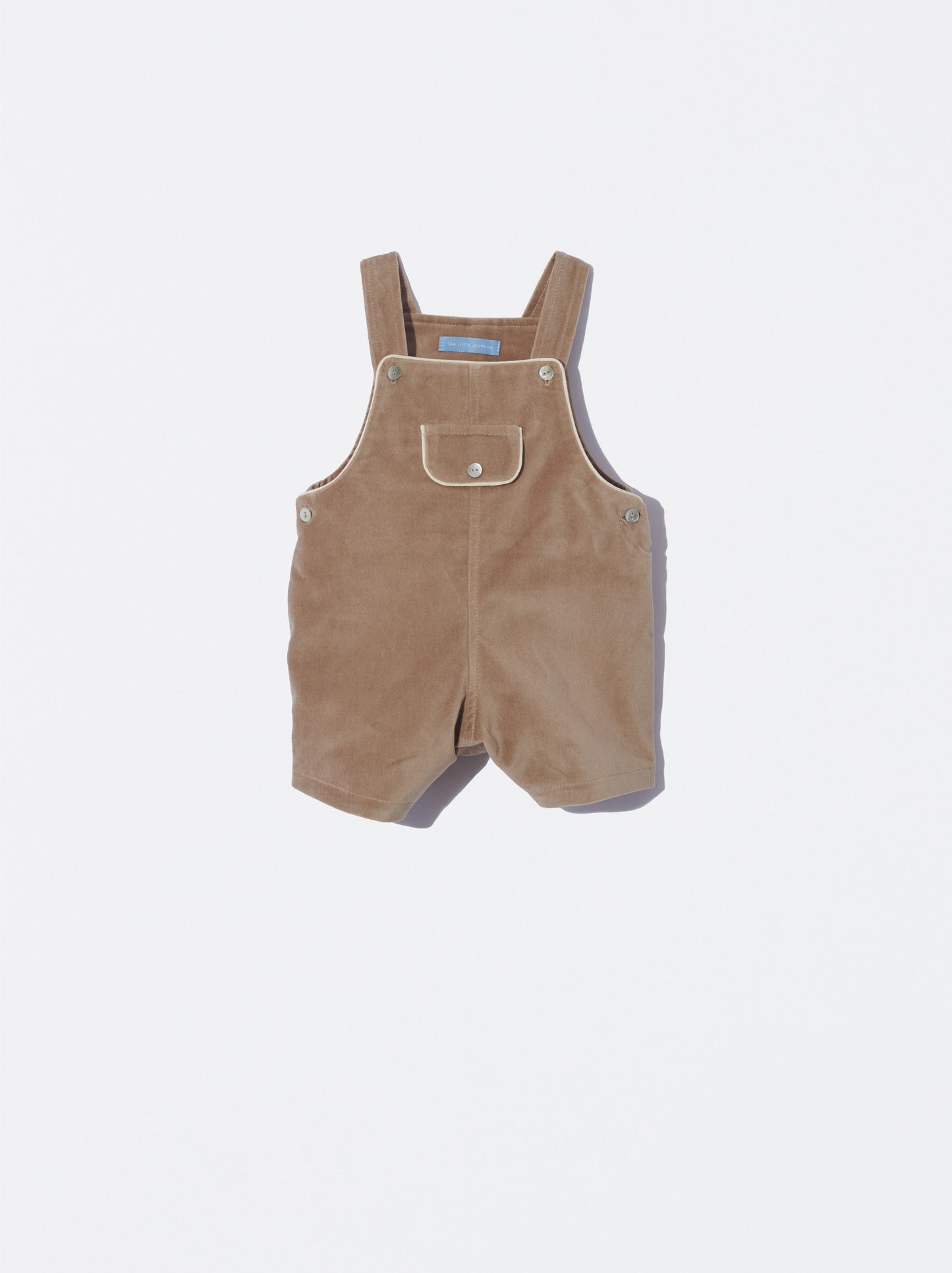 Jardineiras em veludo bege