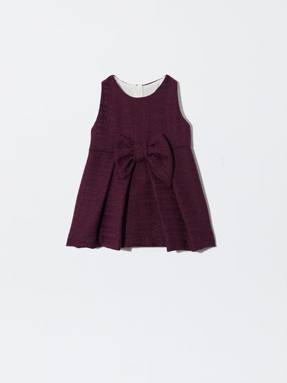 Vestido com laço bordeaux em pied de poule