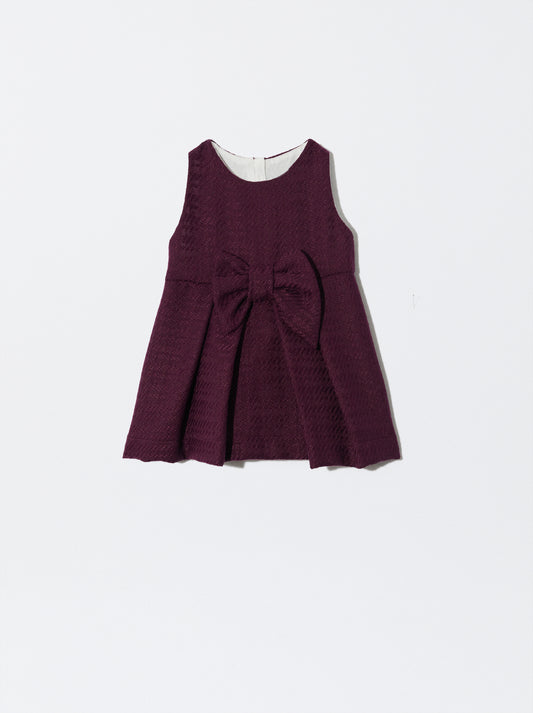 Vestido com laço bordeaux em pied de poule