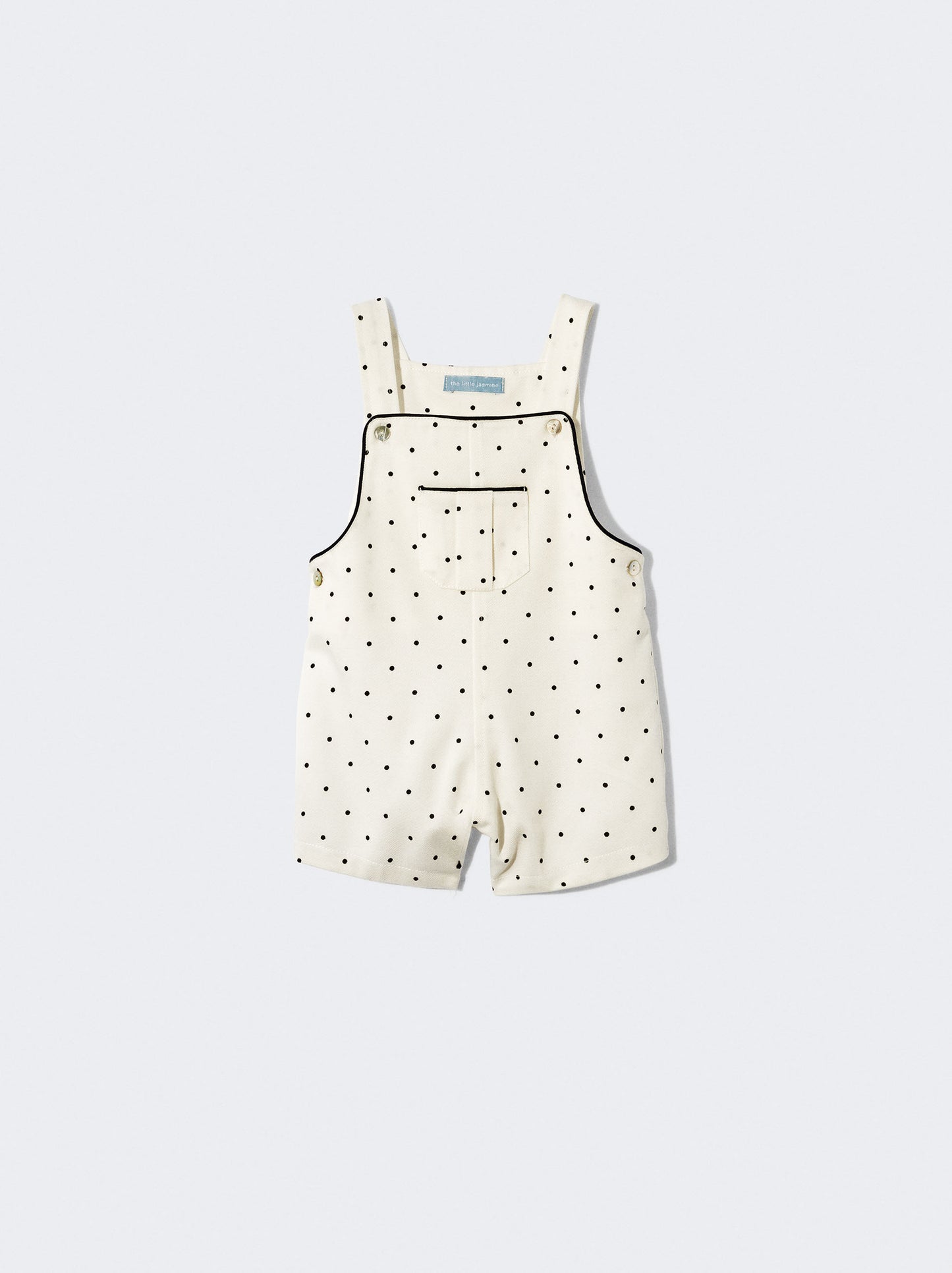 Jardineiras brancas com pintinhas